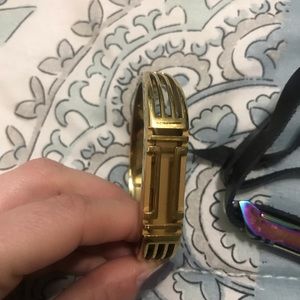 Gold authentic Tory Burch fit bit band in gold